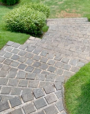 Custom hardscaping in Perth WA — natural stone patios, retaining walls, driveways and outdoor kitchens built to last
